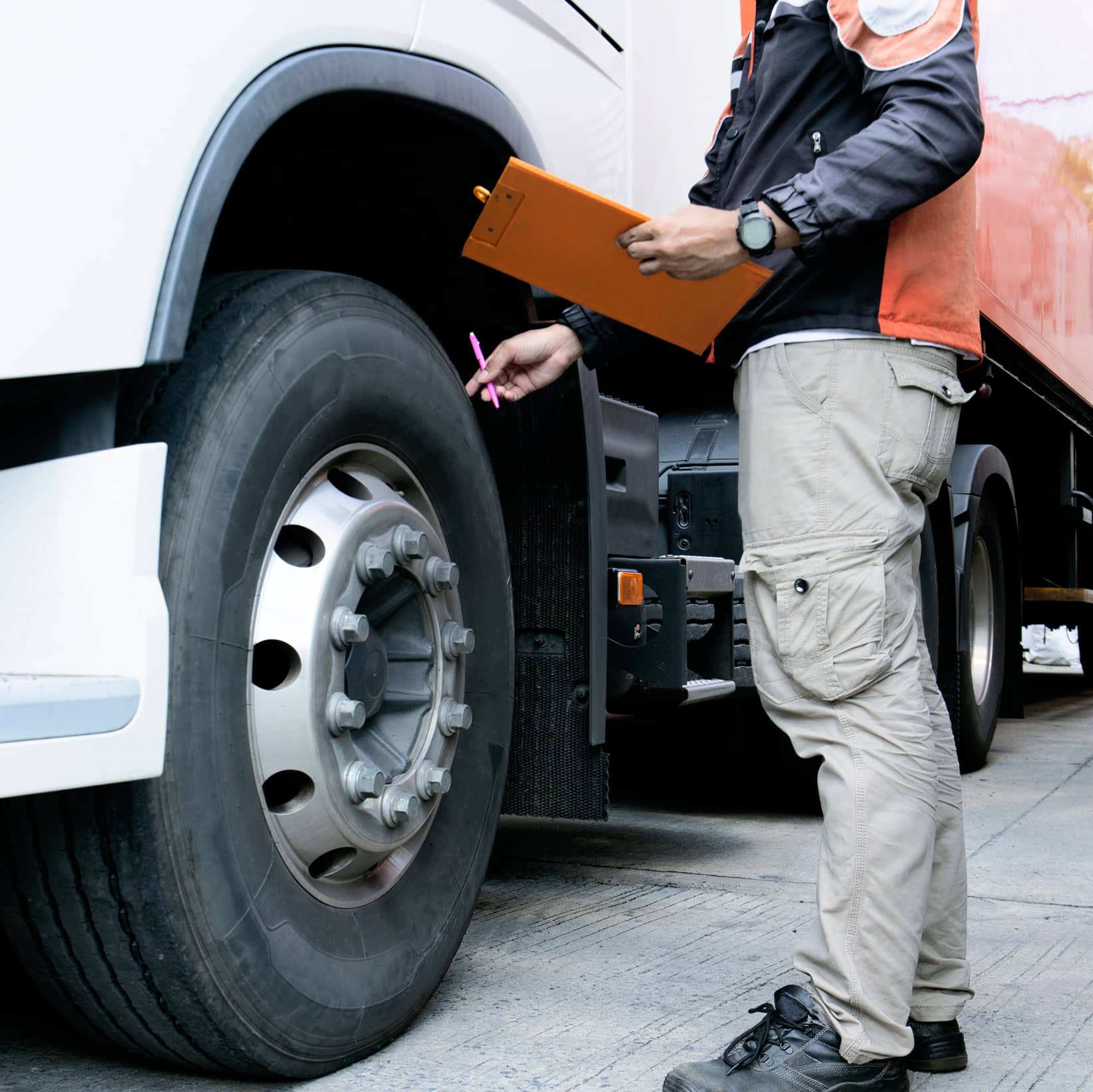 NTC mock audit man checking tires