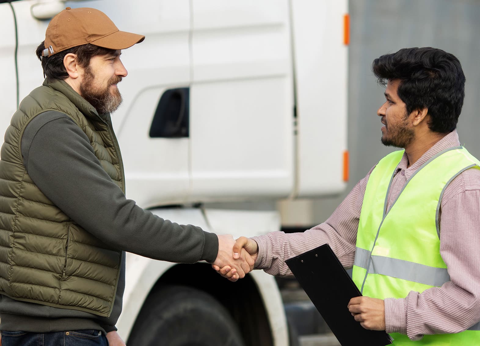NTC Hazmat Training trucker and trainer shaking hands2
